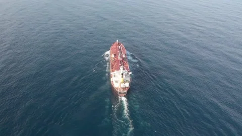 Aerial view of a red deck oil tanker underway on the high seas. Stock Footage 138709853