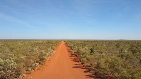 Aerial view Red dirt track outback Australia Stock Footage 115757635