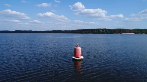 Aerial view. Red floating navigation sign in fairway of a wide navigable river. 스톡 동영상 97853825