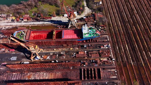 Aerial view of red hulled cargo ship in dry dock, Bulgaria Video stock 343844200