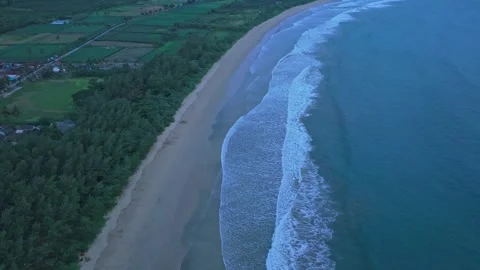 Aerial view of red island java coastline with breaking waves 스톡 동영상 328920239