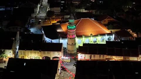 Aerial view red lanterns and Acheh mosque building at night Stock Footage 327804171