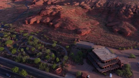 Aerial view of red rock cliffs at sunrise in St George, Utah, USA Stock Footage 333922465