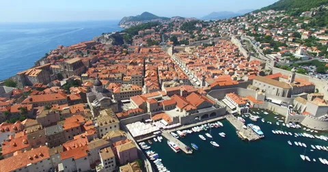 Aerial view of the red roofs of Old Town of Dubrovnik Stock Footage 59545045