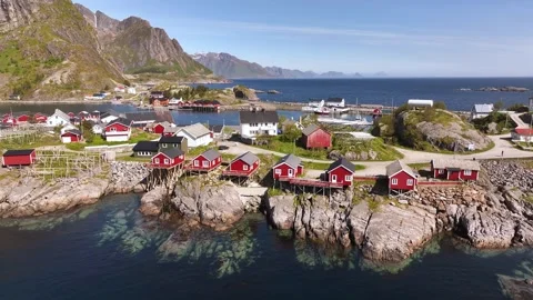 Aerial view of the red rorbu huts in Reine, Lofoten Islands, Norway Stock Footage 248047587