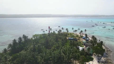 Aerial view of red-striped lighthouse on San Andres beach Stock Footage 331255264