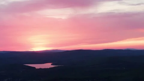 Aerial view of the red sunset over the forest Stock Footage 166357518