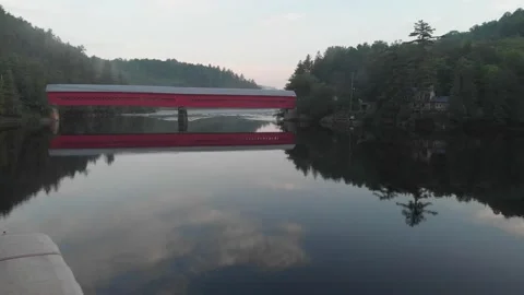 Aerial view of Red timber bridge in Quebec Town Stock Footage 133849893