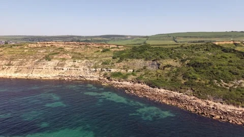 Aerial View of Redcliff Point on the Dorset Coast, England Stock Footage 335901580