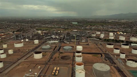 Aerial View of Refinery Complex with Storage Tanks and Pipelines Stock Footage 334950723