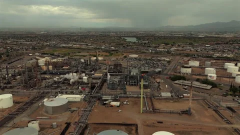 Aerial View of Refinery Processing Units Beneath Storm Clouds Stock Footage 334951203
