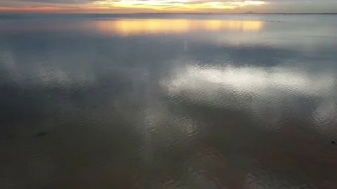 Aerial view of reflection clean pristine ocean Stock Footage 170952135
