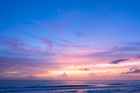 Aerial view reflection of sweet cloud in sunset on the beach. Stock Photos
