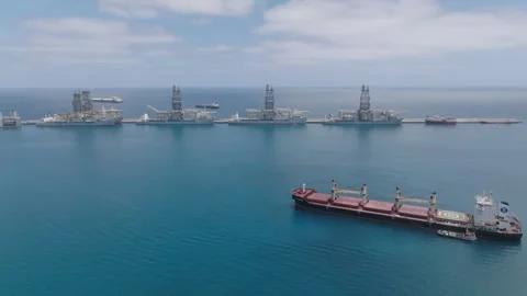 Aerial View of Reina Sofia Pier with Oil Platforms and Cargo Ship, Las Palmas Stock Footage 333007935