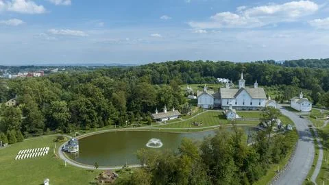 Aerial View Religious Complex With Multiple White Buildings Shining Golden .. Stock Photos