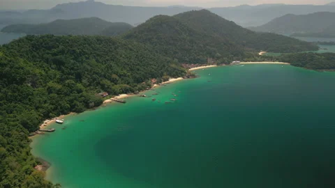 Aerial View of Remote Island, Beachfront Homes, 4k Stock Footage 239686495