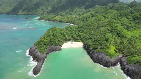 Aerial view of remote Playa Onda beach near Playa Ermitaño on the rocky coast Vídeo Stock 297769006