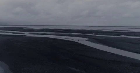 Aerial view of remote river landscape in Iceland during storm Видео 79856924
