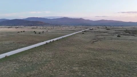 Aerial View of a Remote Road Winding Toward the Bosnia-Croatia Border Peaks Vídeo Stock 331869005