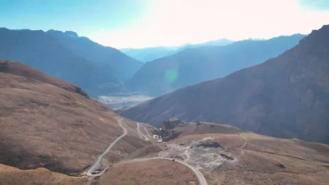Aerial View of Remote Zigzag Road Traversing Arid Desert Mountains in Spiti Video stock 333060468