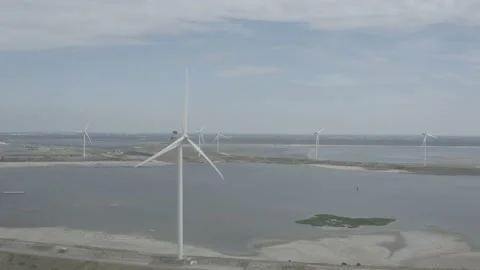 Aerial view of renewable wind turbines zoom in pan Netherlands NL WND DJI 0002 B Stock Footage 140285643