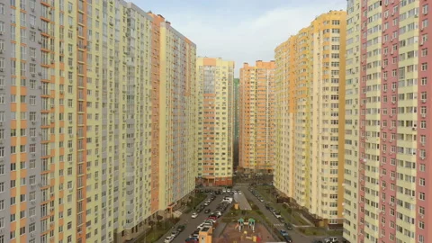 Aerial view of a residential complex with multi-apartment high-rise yellow house Stock Footage 179559391