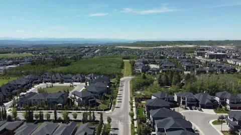 Aerial view of residential development in a Calgary suburb Stock Footage 247978187