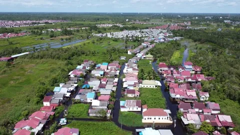 Aerial view of residents' activities experiencing flooding in a residential.. Stock Footage 330334265