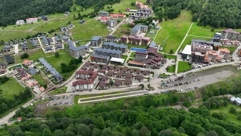 Aerial view of resort hotel complex and cottages in Bakuriani in summer Stock-Footage 341419423
