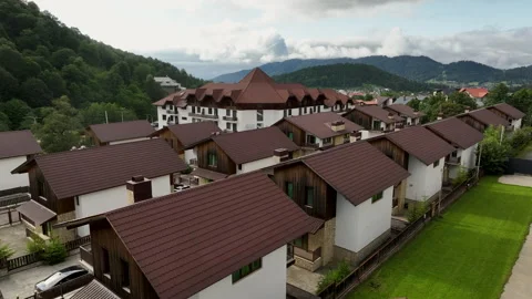 Aerial view of resort hotel complex and cottages in Bakuriani in summer Stock-Footage 341421263