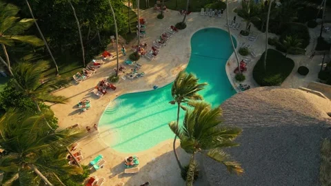 Aerial view of a resort pool at sunset in Punta Cana Video stock 306266728