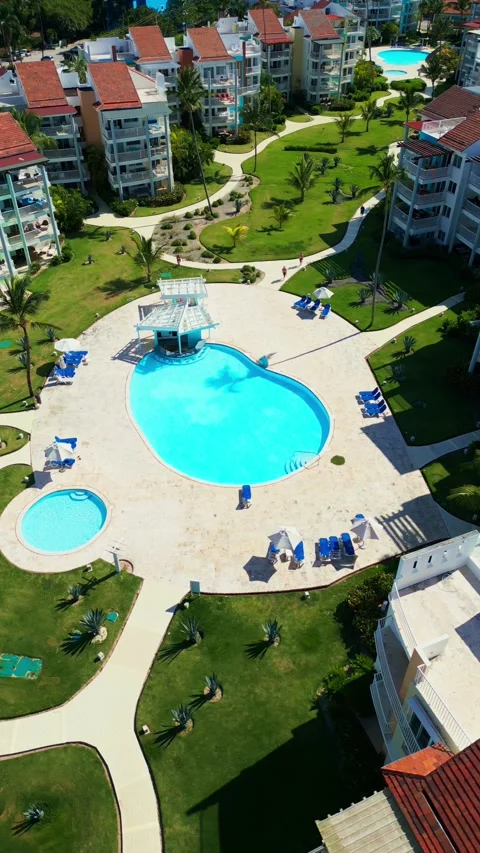 Aerial View of Resort-Style Pool at Luxury Condo in Tropics in Punta Cana Stock Footage 309941542