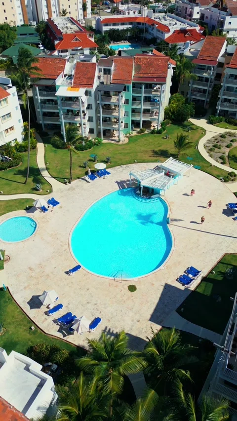 Aerial View of Resort-Style Pool at Luxury Condo in Tropics in Punta Cana Stock Footage 309941562
