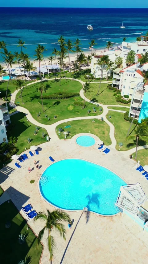 Aerial View of Resort-Style Pool at Luxury Condo in Tropics in Punta Cana Stock Footage 309941691
