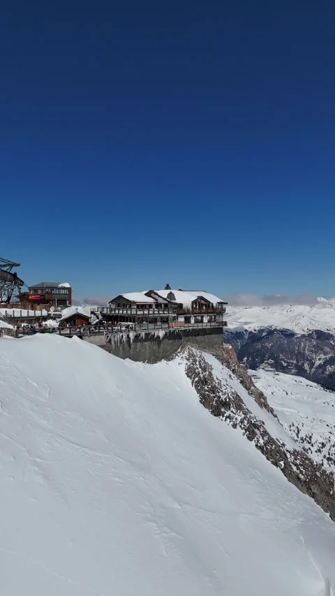 Aerial view of Restaurant Le Panoramic  at Saulire summit Stock Footage 335627048