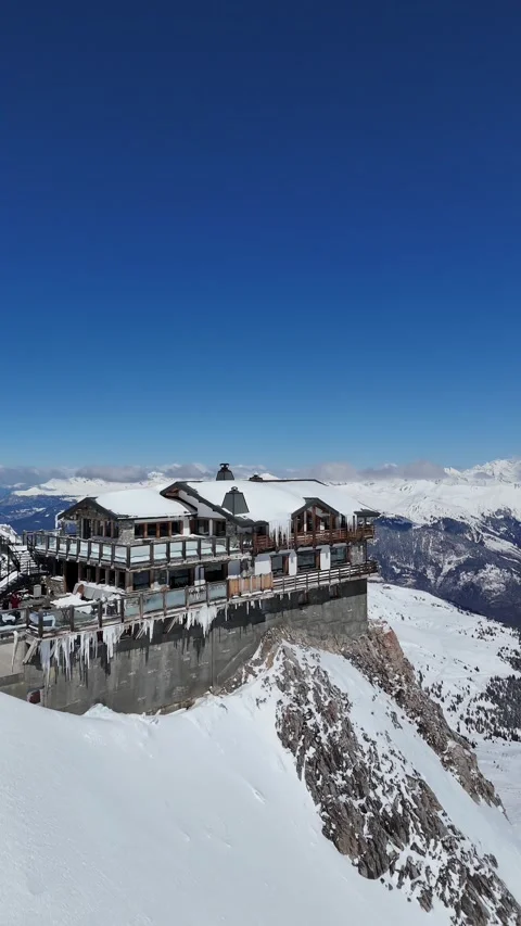 Aerial view of Restaurant Le Panoramic  at Saulire summit Stock Footage 335627710