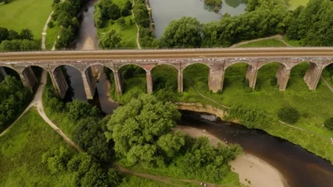 Aerial View, reveal of Viaduct in Reddish Vale, Stockport, Manchester. Stock Footage