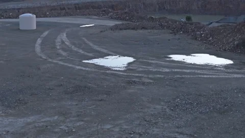 Aerial view revealing a large open-pit mine quarry Vidéo 342518239