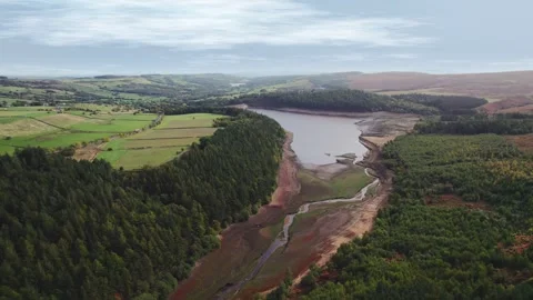 Aerial view reveals a partially dried reservoir Vidéo 343870852