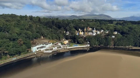 Aerial view, reverse move. Drone panorama of famous tourist village Portmeiri Stock Footage 94237533