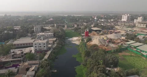 Aerial view of rice fields and urban development, Bangladesh. Stock Footage 303973628