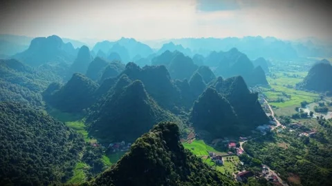 Aerial View of Rice Fields and Karst Mountains in Trung Khanh Stock Footage 345386951