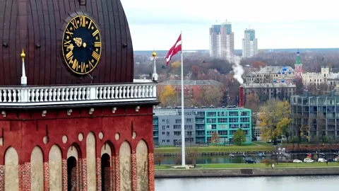 Aerial View of Riga Cathedral Clock Tower and Daugava River in Autumn Stock Footage 296567696