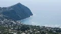 Aerial view of rippled blue Tyrrhenian sea, Ischia island coastline, sunny day HD Footage
