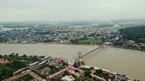 Aerial view of Rishikesh city during monsoon, Drone shot of Janki Setu Stock Footage 161114551