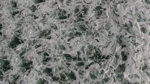 Aerial View Rising Above Waves Crashing Video stock 84747372