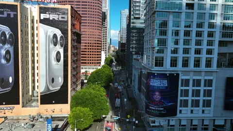 Aerial view rising in front of the Figueroa Street, sunny day in Los Angeles Stock Footage 322509272
