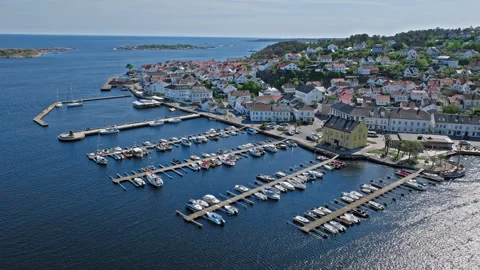 Aerial view of Risor Norway harbour with boats and colourful wooden houses. Stock Footage 328125969