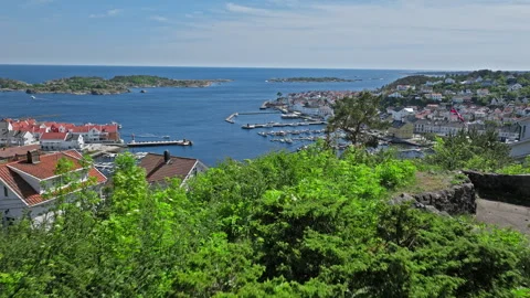 Aerial view of Risor Norway marina with boats and colorful wooden houses . Stock Footage 328124933