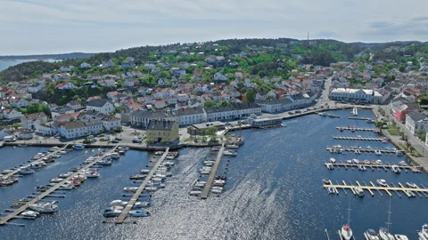 Aerial view of Risor Norway marina with boats and colorful wooden houses. Stock Footage 328125395